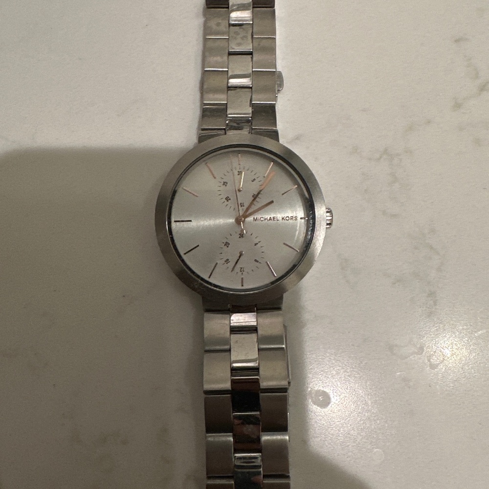 Michael Kors Watch- silver, women’s, perfect condition. Needs a battery.